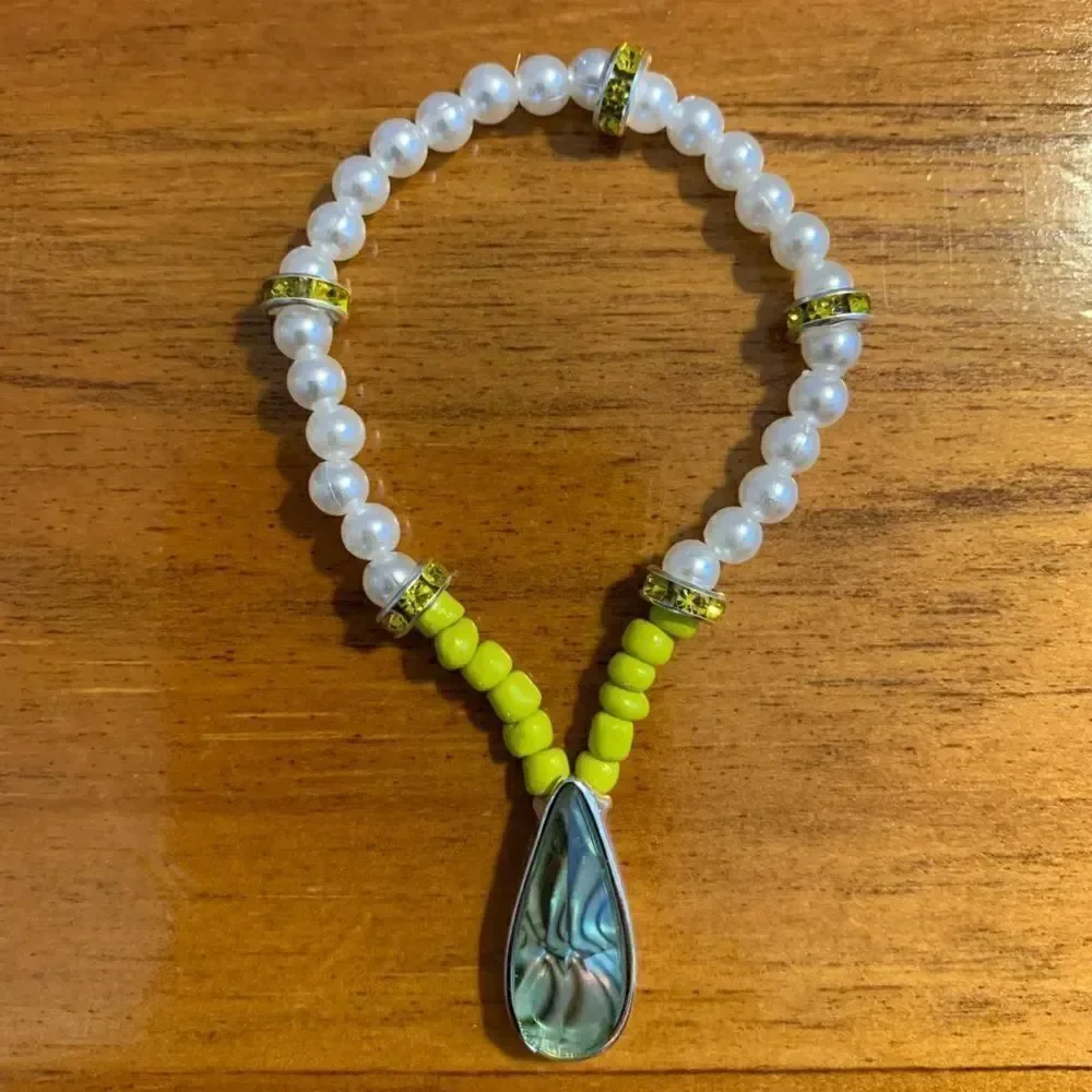 Handmade yellow white beaded stretch charm bracelet